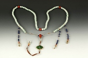 A Chinese jadeite court beads strand