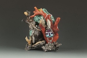 A figural group decorated with semi-precious stones