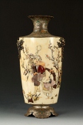 A Japanese carved ivory with ornaments vase