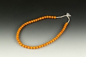 A strand of amber beads necklace
