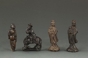 Four Chinese carved horn figures