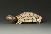 An ivory carved turtle figure