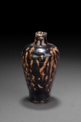 A Japanese glazed vase