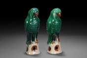 A pair of sancai glazed parrots