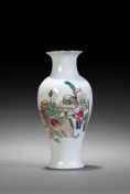 A 'Famille Rose' decorated vase with a fair lady and child.