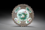 A Chinese silver and ceramic lotus plate