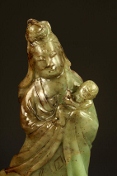 A Chinese carved jade Guanyin figure