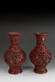 A PAIR OF CARVED CINNABAR LACQUER BOTTLE