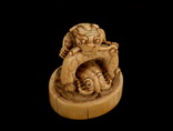 A CARVED IVORY STAMP SEAL