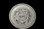 AN UNDERGLAZED BLUE AND WHITE SAUCER