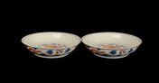 A PAIR OF UNDERGLAZED BLUE AND WHITE DISH WITH DESIGNS OF DRAGONS AND CLOUD PATTERNS