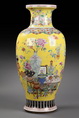 A LARGE YELLOW GROUND FAMIILLE ROSE VASE