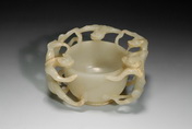 A CARVED JADE CUP WITH FIVE DRAGONS