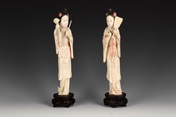 A PAIR OF IVORY CARVED MEIREN FIGURES