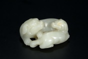 A WELL CARVED HETIAN JADE ANIMAL PIECE