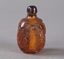 Amber snuff bottle