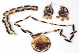 A set of tortoise shell jewelry