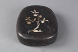A carved inkstone with cover