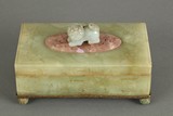 A carved jade lidded box