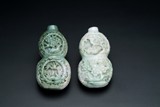 A Chinese pair (2) of carved jade ornaments