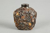 A Chinese tortoise shell snuff bottle