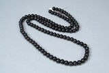 A wood prayer beads strand