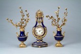 A set of European style clock and two candelabra