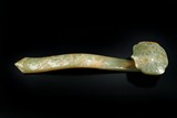 A WELL-CARVED CELADON JADE RUYI SCEPTER