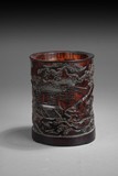 A WELL CARVED BAMBOO BRUSHPOT