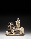 A JAPANESE CARVED IVORY ORNAMENTED GUANYIN FIGURAL GROUP