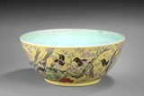 A LARGE FAMILLE ROSE 'FLOWERS AND BIRDS' BOWL