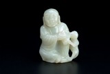 A CHINESE JADE CARVED HANDLING PIECE