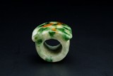 A CHINESE JADEITE THUMB RING