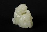 A CARVED JADE LIONS FIGURAL GROUP