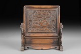 A CARVED WOOD TABLE SCREEN