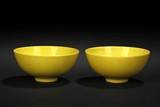 A PAIR OF YELLOW GLAZED BOWLS