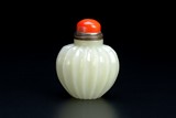 A CHINESE MELON FORM JADE SNUFF BOTTLE