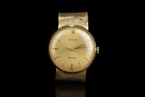 A VINTAGE ROLEX PRECISION 18K GOLD WATCH WITH 18K YELLOW GOLD BAND