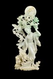 A JADEITE CARVING OF BEAUTY