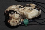 A JADE 'LION AND CUB' CARVING