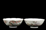 A PAIR OF FAMILLE ROSE 'BIRDS AND FLOWERS' BOWLS