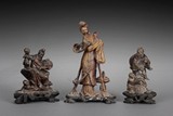 A GROUP OF THREE QINGTIAN SOAPSTONE CARVINGS OF PEOPLE