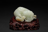 A WHITE JADE 'THREE GOATS' CARVING