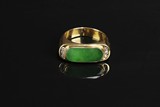 A 18K YELLOW GOLD JADEITE RING WITH DIAMONDS