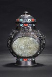 A CARVED SILVER MOON FLASK EMBEDDED WITH JADE