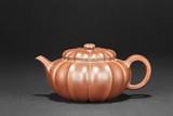LONG WEN: A RED CLAY 'NARCISSUS' TEAPOT