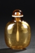 A GOLDEN AMBER-BROWN GLASS SNUFF BOTTLE