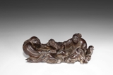 A CARVED LONGYAN WOOD 'TWO IMMORTALS AND TOAD' FIGURAL GROUP