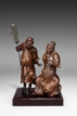 A CARVED BOXWOOD ROOT 'GUANGONG AND ZHOUCANG' FIGURAL GROUP