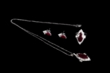 A SET OF NATURAL RUBY JEWELRY WITH GIA CERTIFICATE